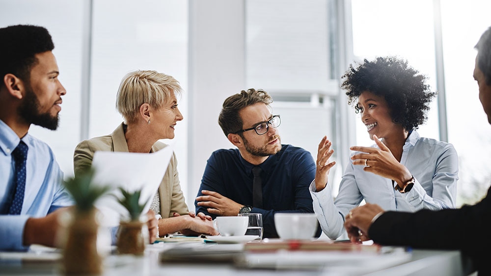 Businesspeople sitting together in a meeting
