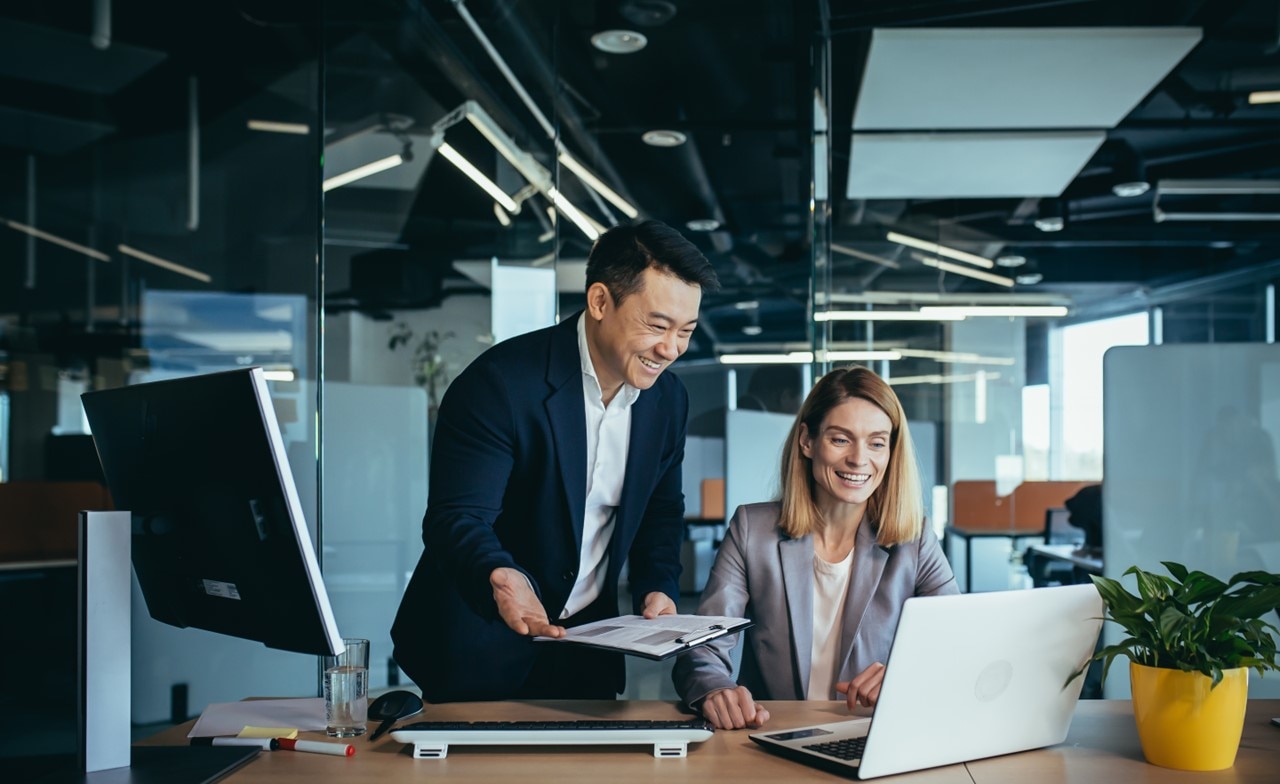 Colleagues discussing application services