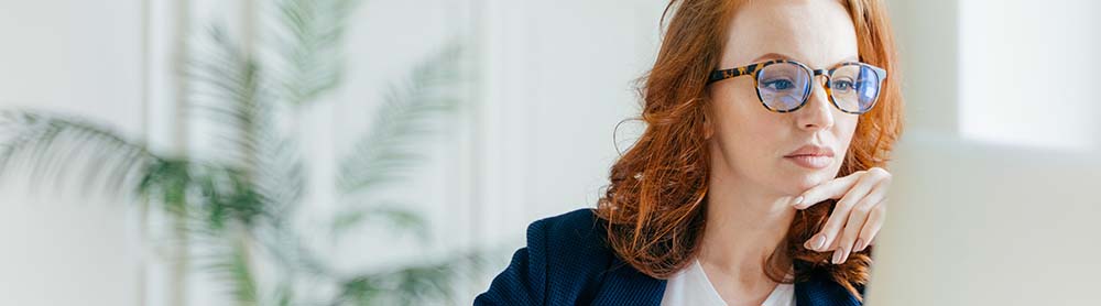 Consultant looking at laptop screen