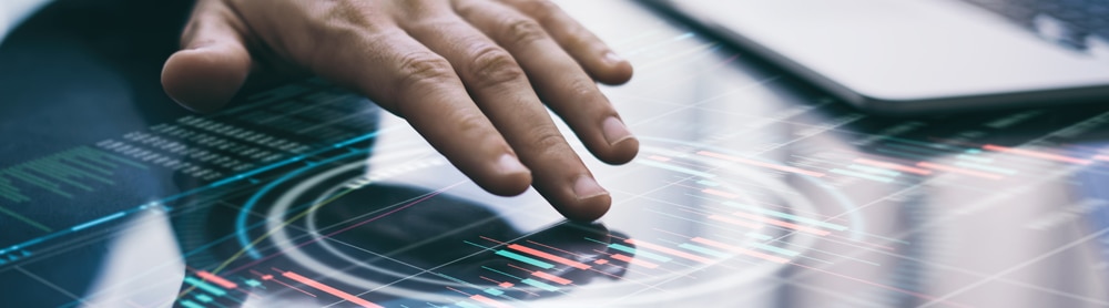 finger pointing at digital board