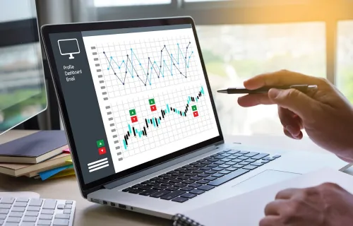 person tracking data on laptop monitor