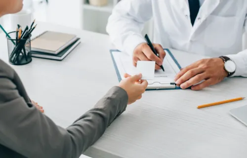 Health payer and provider discussion across a table