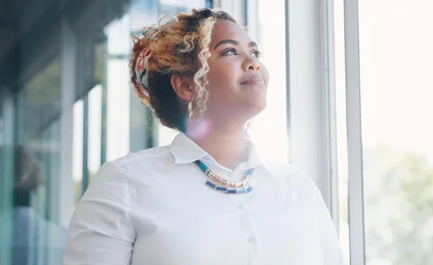 Consultant looking out a window