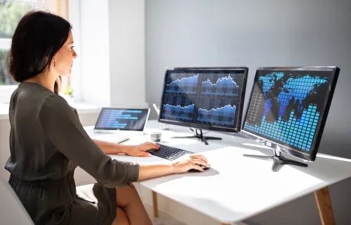 consultant looking at data visualization screens