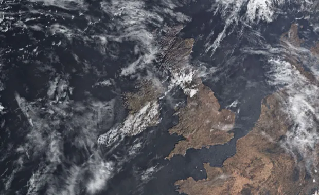 Weather events including clouds covering earth as seen from space