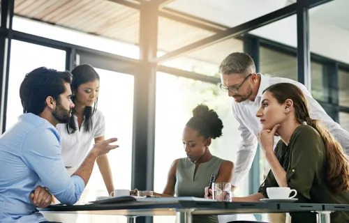 Group of colleagues working at a table