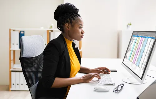 women working to implement implement enterprise financial system