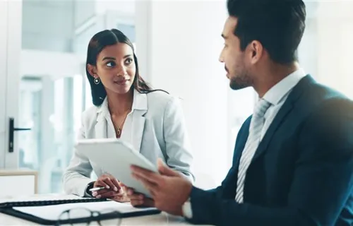 Man and women consulting on a project