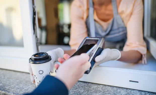 Man making fast food payment