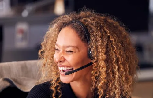 professional smiling with heaphones