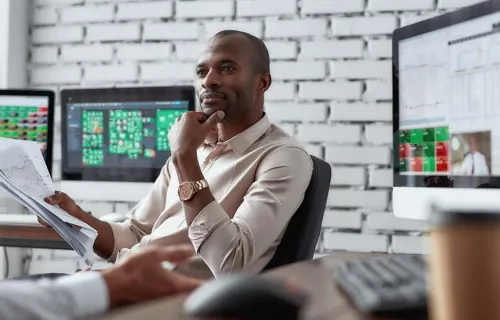 IT consultants reviewing a report