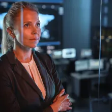 woman in space mission control center