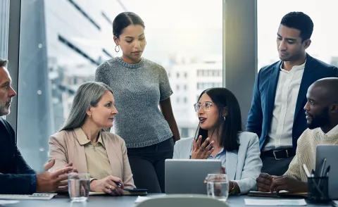 Team sitting around table