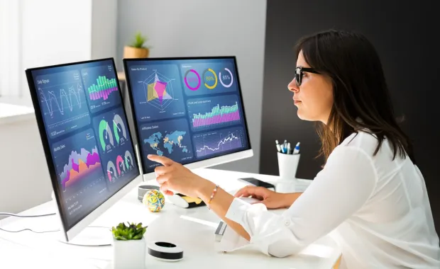 woman working with data on a computer